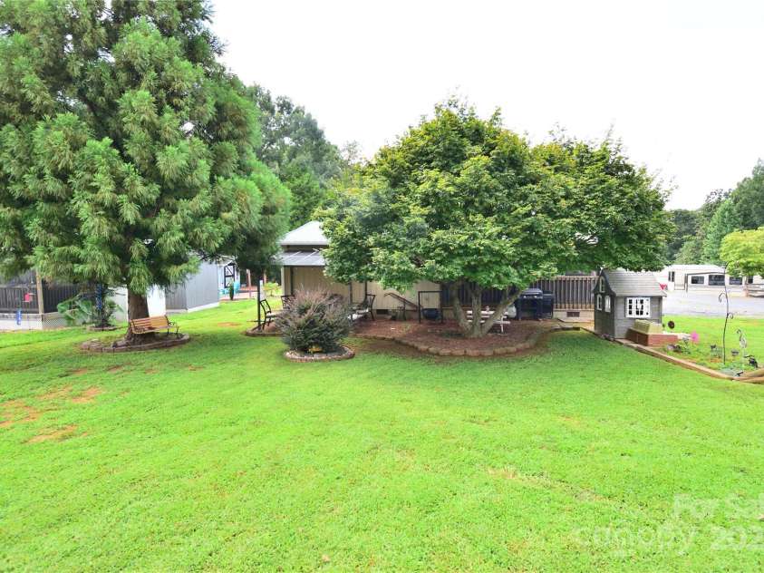 101 Hummingbird Circle, New London, NC 28127.  MLS# CAR4293421, YatesRealty ID 33406. Huge yard