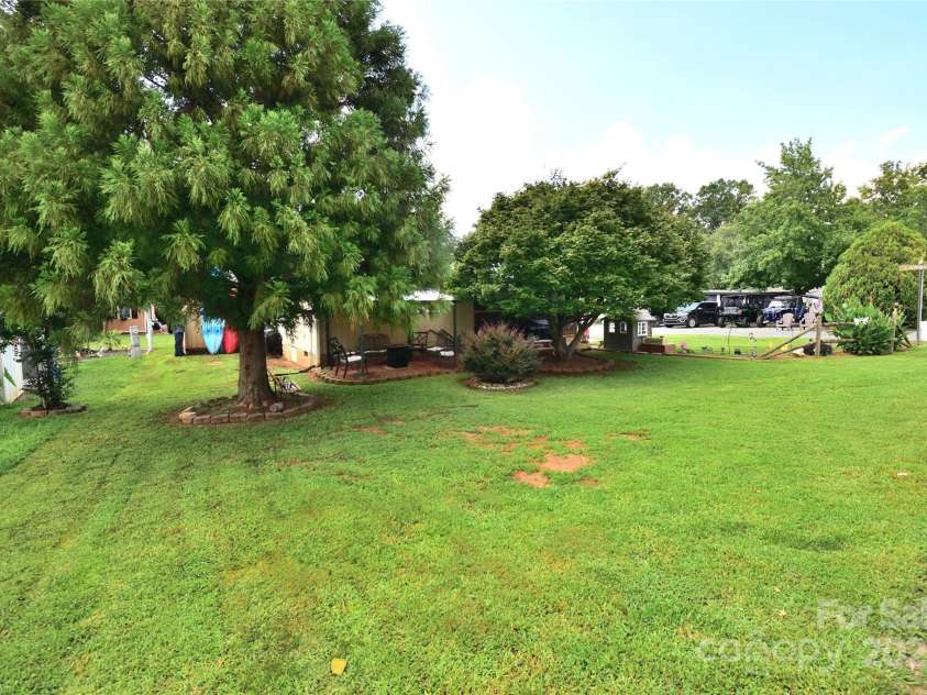 101 Hummingbird Circle, New London, NC 28127.  MLS# CAR4293421, YatesRealty ID 33406. Huge yard