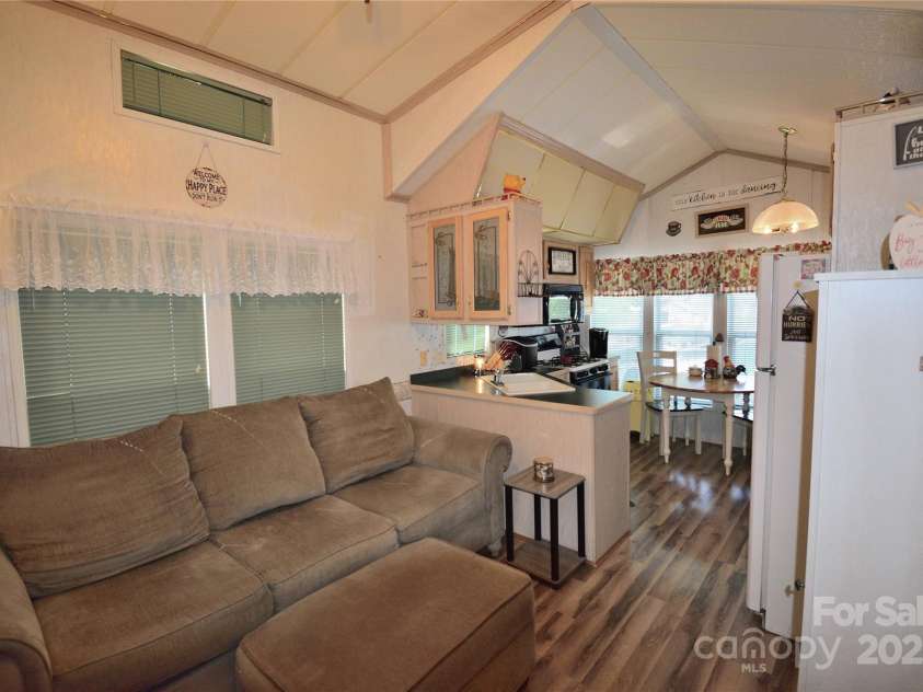 101 Hummingbird Circle, New London, NC 28127.  MLS# CAR4293421, YatesRealty ID 33406. Living room