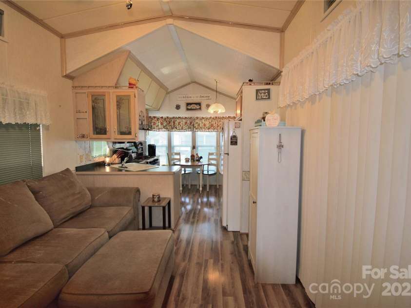 101 Hummingbird Circle, New London, NC 28127.  MLS# CAR4293421, YatesRealty ID 33406. Living room