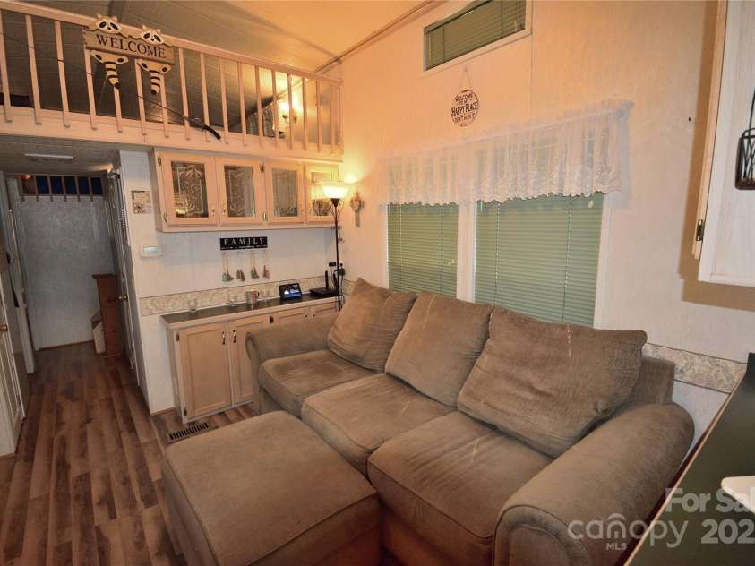 101 Hummingbird Circle, New London, NC 28127.  MLS# CAR4293421, YatesRealty ID 33406. Living room