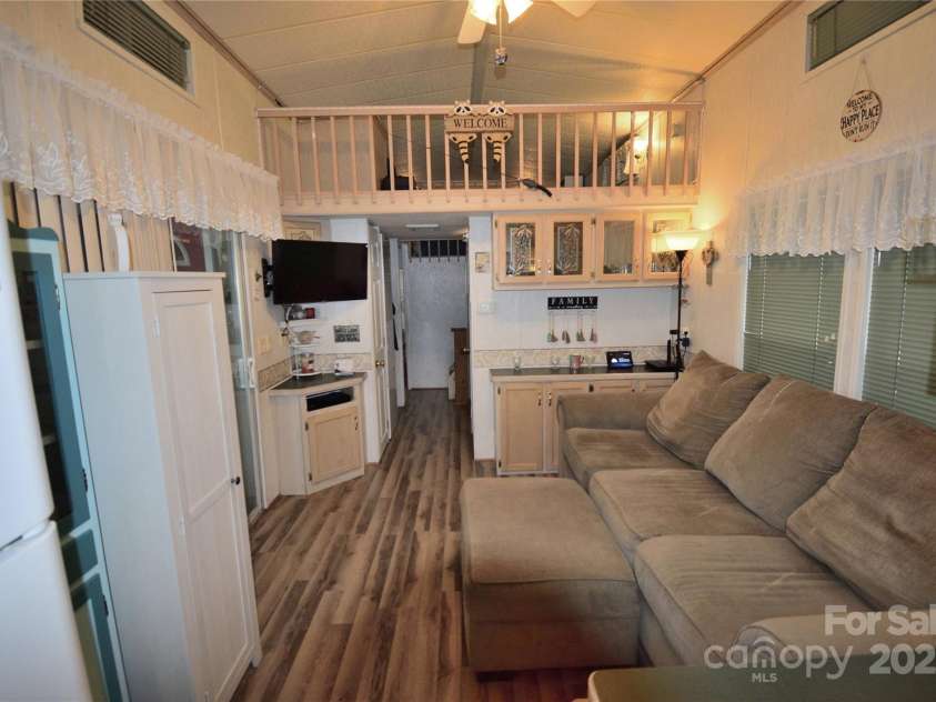 101 Hummingbird Circle, New London, NC 28127.  MLS# CAR4293421, YatesRealty ID 33406. Living room