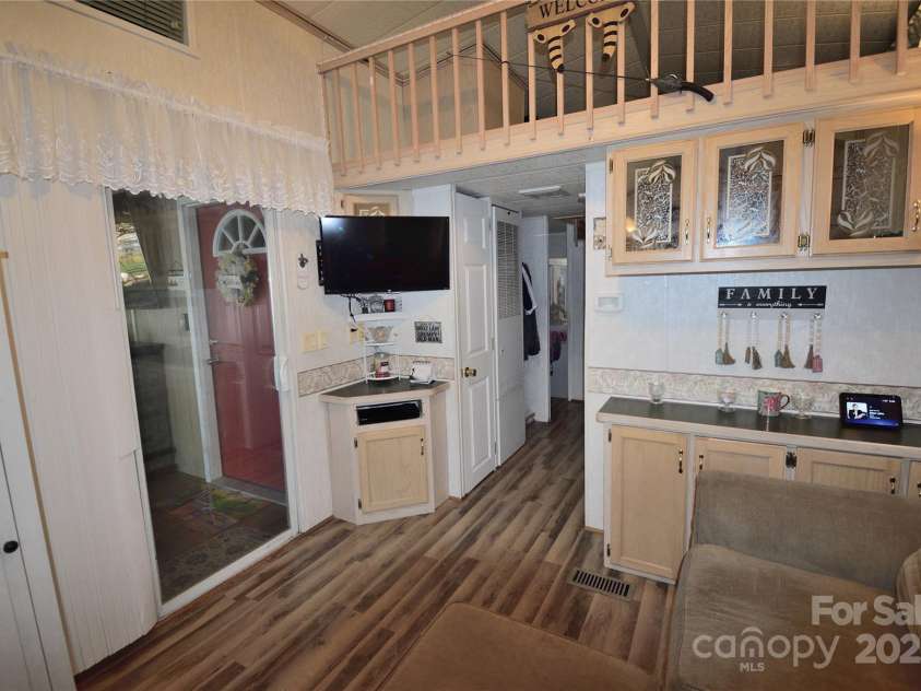 101 Hummingbird Circle, New London, NC 28127.  MLS# CAR4293421, YatesRealty ID 33406. Living room