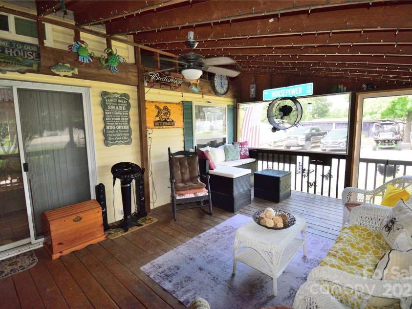 101 Hummingbird Circle, New London, NC 28127.  MLS# CAR4293421, YatesRealty ID 33406. Screened in porch