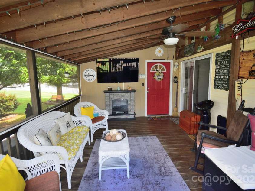 101 Hummingbird Circle, New London, NC 28127.  MLS# CAR4293421, YatesRealty ID 33406. Screened in porch