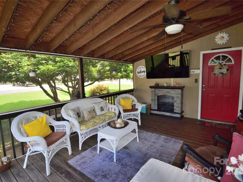 101 Hummingbird Circle, New London, NC 28127.  MLS# CAR4293421, YatesRealty ID 33406. Screened in porch