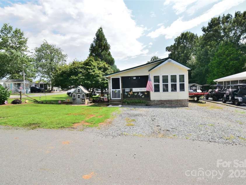 101 Hummingbird Circle, New London, NC 28127.  MLS# CAR4293421, YatesRealty ID 33406. Tons of parking along the front and on right side of home