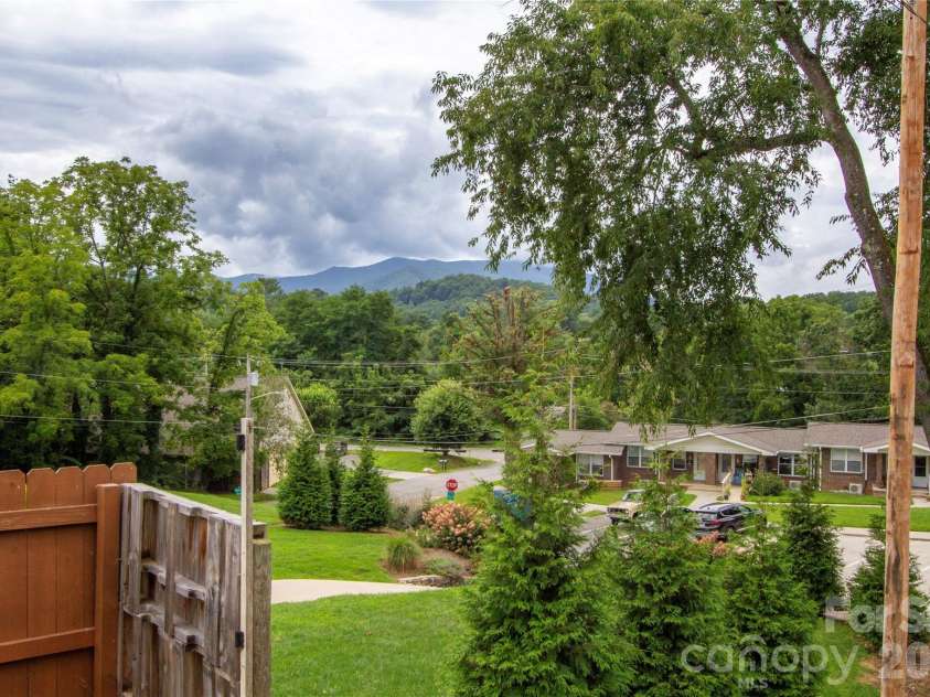 30 Babb Street, Waynesville, NC 28786.  MLS# CAR4280509, YatesRealty ID 3341. Mountain views from the Front Porch