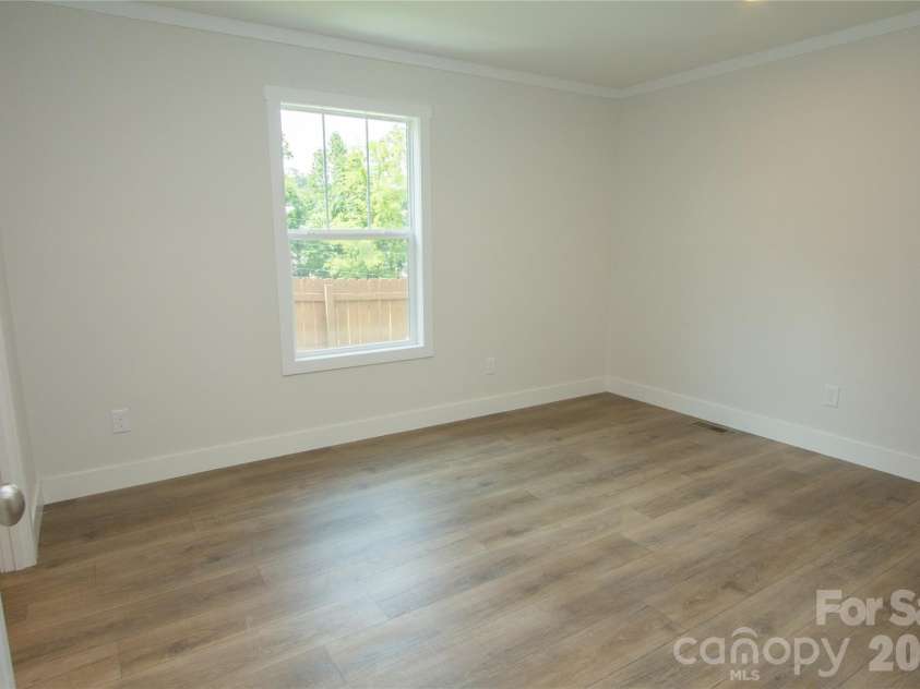 30 Babb Street, Waynesville, NC 28786.  MLS# CAR4280509, YatesRealty ID 3341. Primary Bedroom