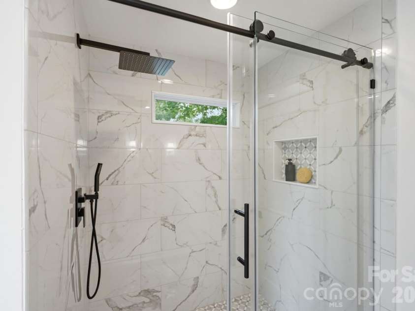 3800 Lovett Circle, Charlotte, NC 28210.  MLS# CAR4389040, YatesRealty ID 33413. Rainfall shower head with handwand  Marble Satori Flower Polished Marble Arabesque Mosaic, Transome window