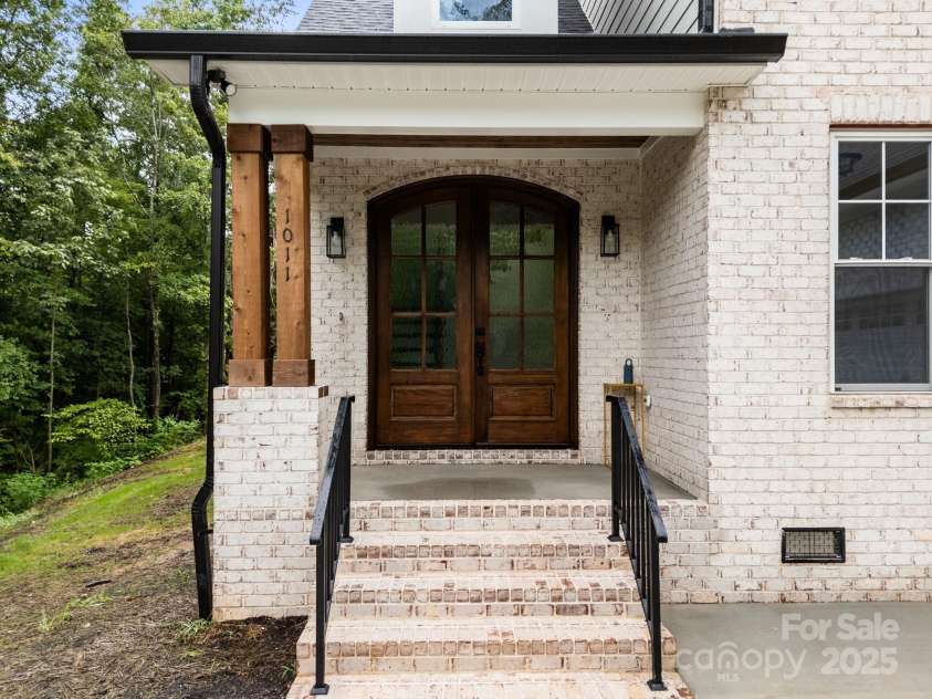 1011 Timber Run Drive, Salisbury, NC 28146.  MLS# CAR4289620, YatesRealty ID 33418. Beautifully Stained Wooden Doors!!