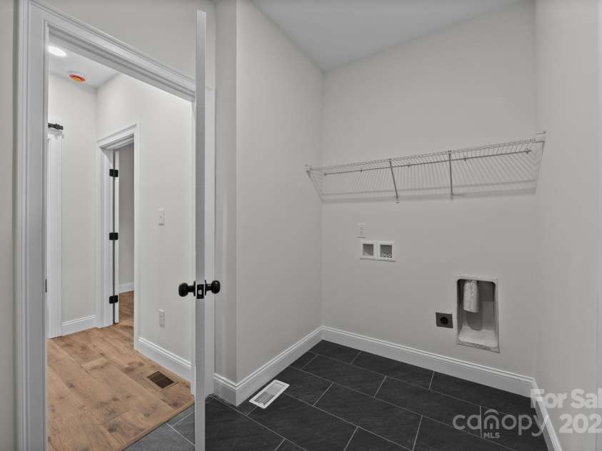 1011 Timber Run Drive, Salisbury, NC 28146.  MLS# CAR4289620, YatesRealty ID 33418. Laundry Room