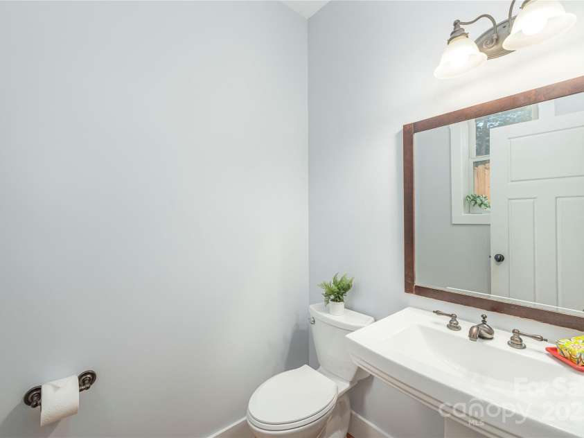 36 Richie Street, Asheville, NC 28801.  MLS# CAR4289429, YatesRealty ID 33422. Main level half bath