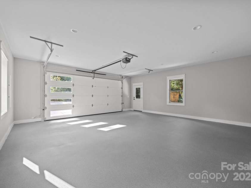 3 River Stone Trail, Asheville, NC 28805.  MLS# CAR4279056, YatesRealty ID 33429. Inside Garage