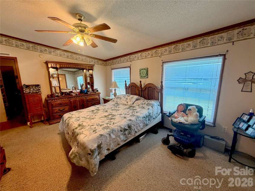 1668 Lane Road, Mount Holly, NC 28120.  MLS# CAR4395972, YatesRealty ID 33430. Primary Bedroom