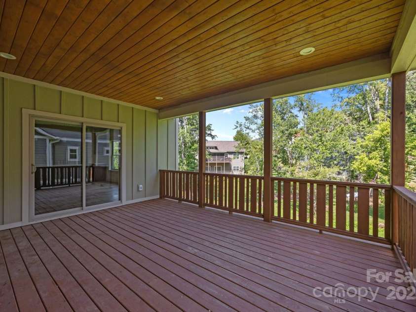 58 Pinedale Road, Asheville, NC 28805.  MLS# CAR4271853, YatesRealty ID 33430. Covered back deck