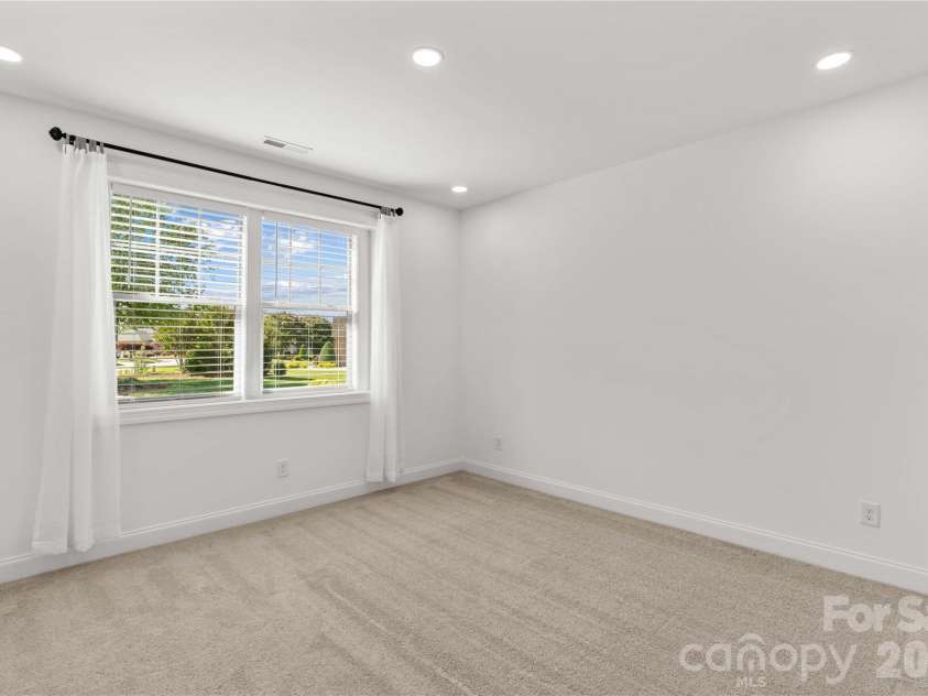 547 Muirfield Way, Salisbury, NC 28144.  MLS# CAR4385547, YatesRealty ID 33431. Bedroom #2 looking toward front facing windows.