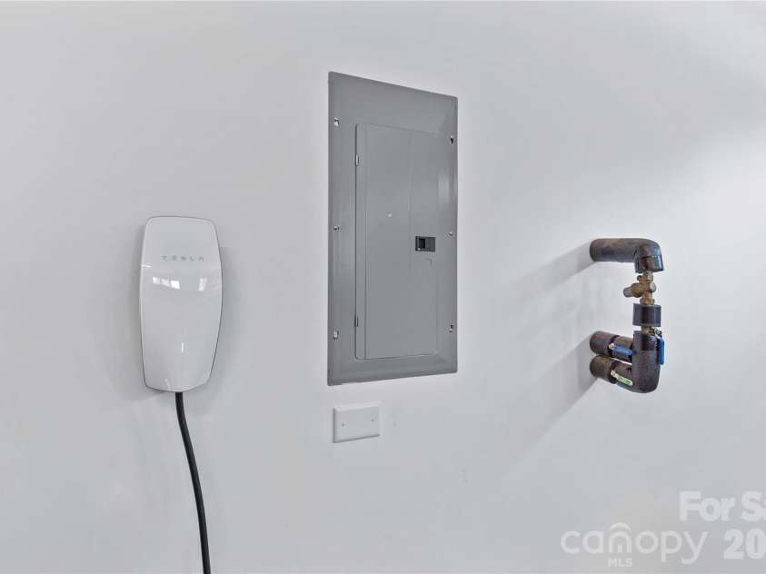547 Muirfield Way, Salisbury, NC 28144.  MLS# CAR4385547, YatesRealty ID 33431. EV charging station in garage