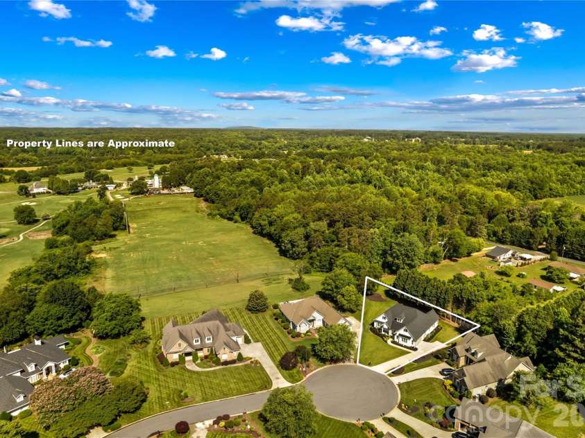 547 Muirfield Way, Salisbury, NC 28144.  MLS# CAR4385547, YatesRealty ID 33431. Golf course driving range views in back.