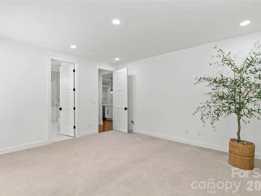 547 Muirfield Way, Salisbury, NC 28144.  MLS# CAR4385547, YatesRealty ID 33431. Primary suite facing spa-like bathroom and kitchen.