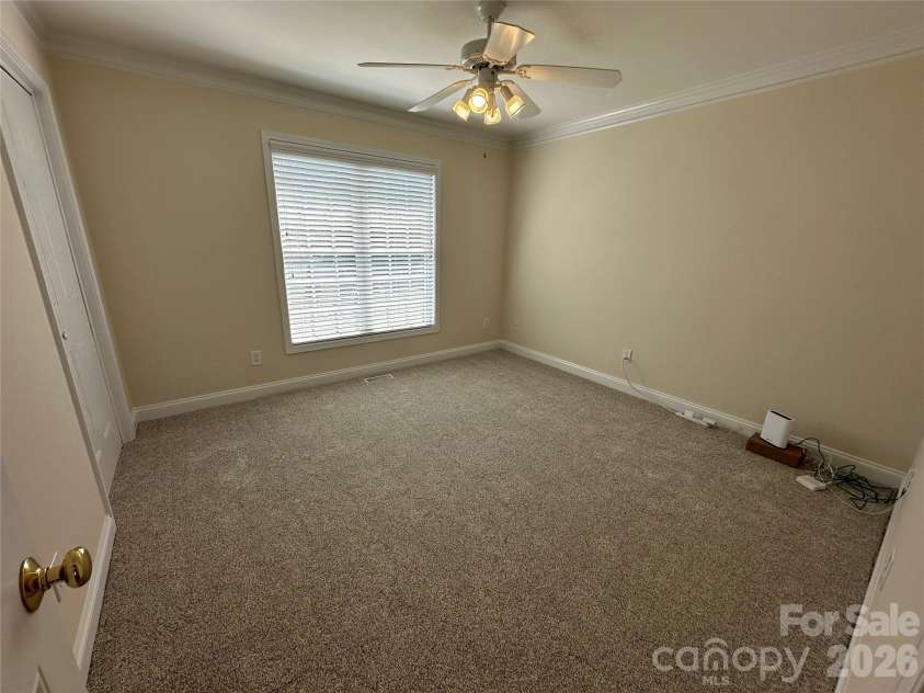 165 Bishop Lane, Concord, NC 28025.  MLS# CAR4395082, YatesRealty ID 33432. 1st floor bedroom
