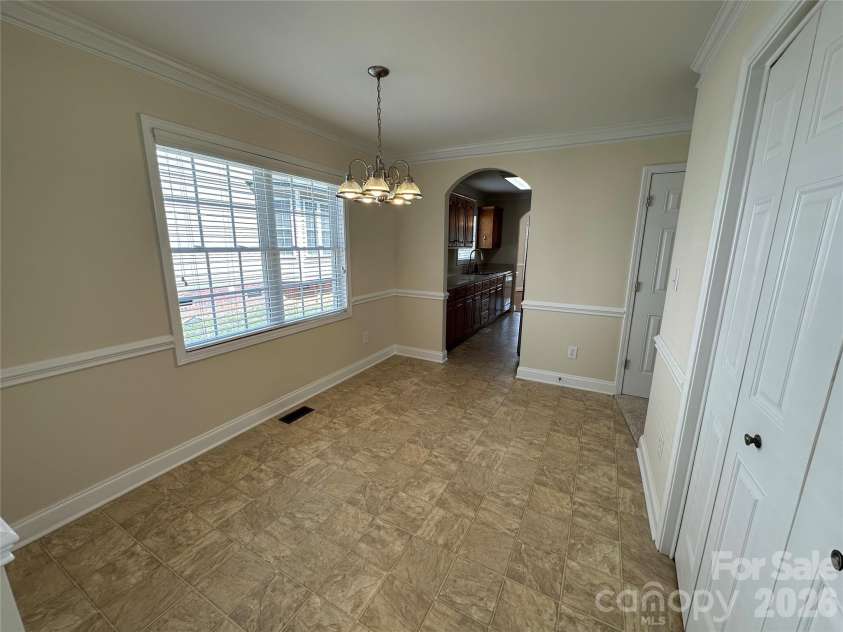 165 Bishop Lane, Concord, NC 28025.  MLS# CAR4395082, YatesRealty ID 33432. Breakfast area view from side door entry