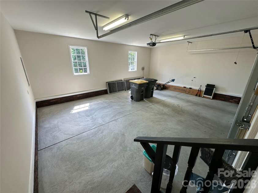 165 Bishop Lane, Concord, NC 28025.  MLS# CAR4395082, YatesRealty ID 33432. Full finished 2-car side-load garage