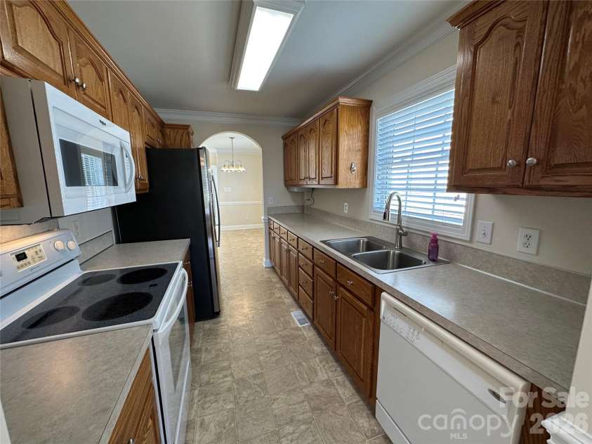 165 Bishop Lane, Concord, NC 28025.  MLS# CAR4395082, YatesRealty ID 33432. Newer microwave & Refrigerator