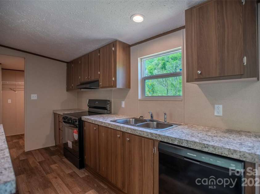 1455 Newfound Road, Leicester, NC 28748.  MLS# CAR4289010, YatesRealty ID 33433. 