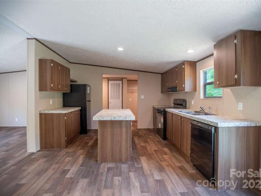 1455 Newfound Road, Leicester, NC 28748.  MLS# CAR4289010, YatesRealty ID 33433. 