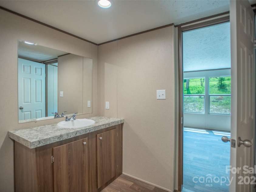 1455 Newfound Road, Leicester, NC 28748.  MLS# CAR4289010, YatesRealty ID 33433. 