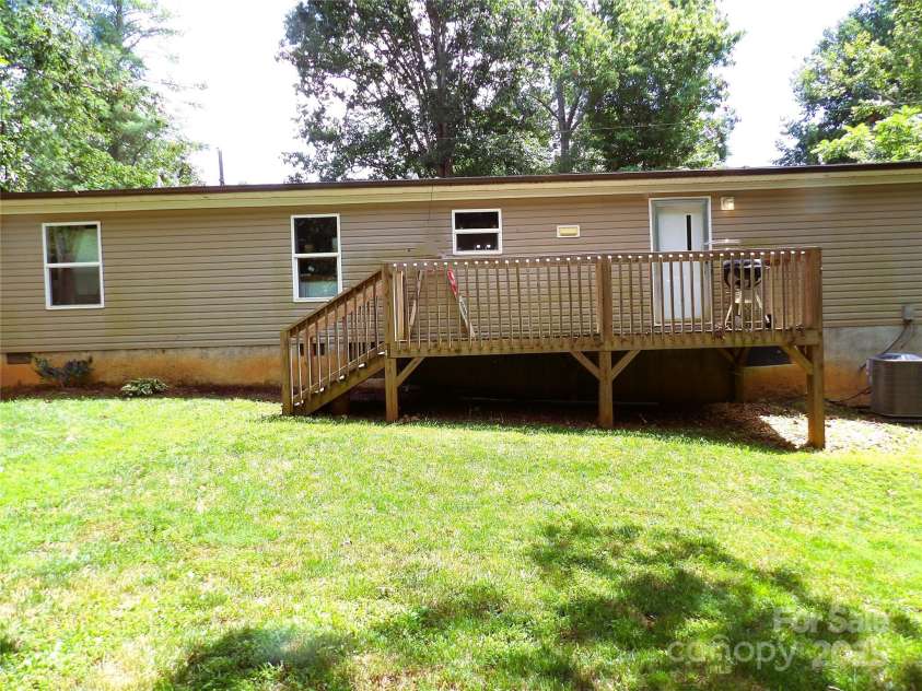 31 Mcgee Hill Road, Fairview, NC 28730.  MLS# CAR4289584, YatesRealty ID 33434. Back of Home