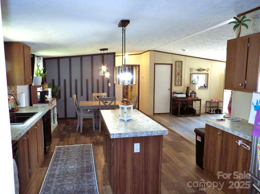 31 Mcgee Hill Road, Fairview, NC 28730.  MLS# CAR4289584, YatesRealty ID 33434. Kitchen to Dining