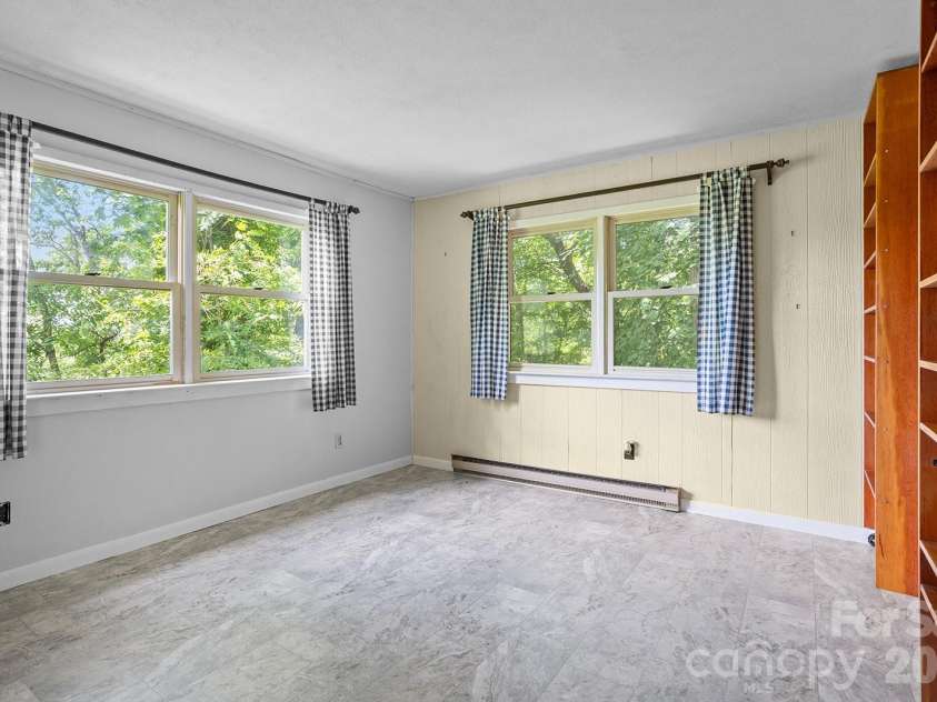 376 Stoney Brook Road, Penrose, NC 28766.  MLS# CAR4397828, YatesRealty ID 33434. Main level bedroom 1