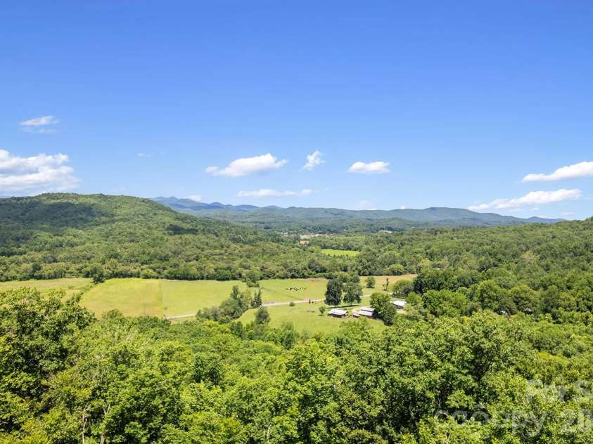 376 Stoney Brook Road, Penrose, NC 28766.  MLS# CAR4397828, YatesRealty ID 33434. Panoramic long-range views from the main level