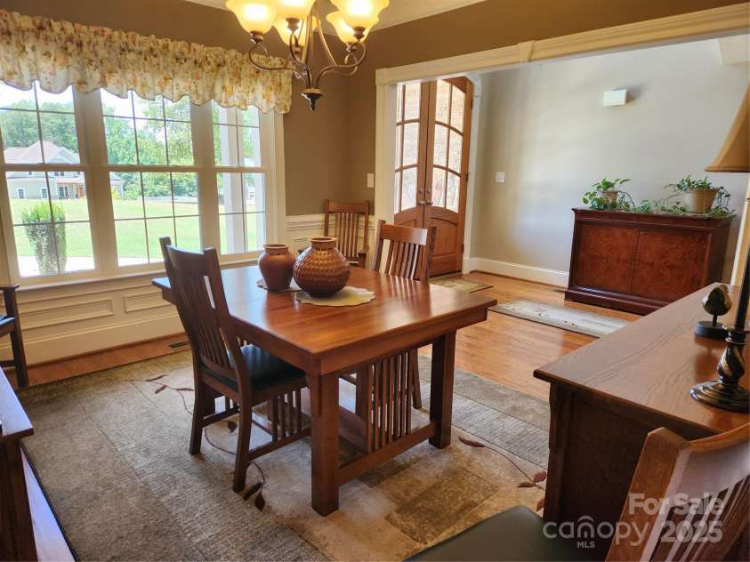 146 Orchard Farm Lane, Mooresville, NC 28117.  MLS# CAR4284274, YatesRealty ID 33442. Dining room with view of front entrance