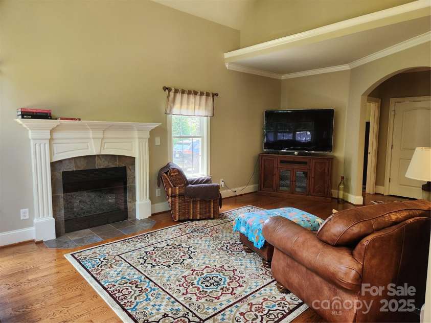 146 Orchard Farm Lane, Mooresville, NC 28117.  MLS# CAR4284274, YatesRealty ID 33442. Fireplace in great room