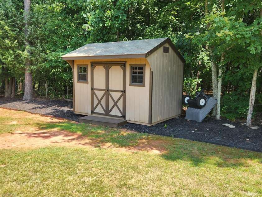 146 Orchard Farm Lane, Mooresville, NC 28117.  MLS# CAR4284274, YatesRealty ID 33442. Shed
