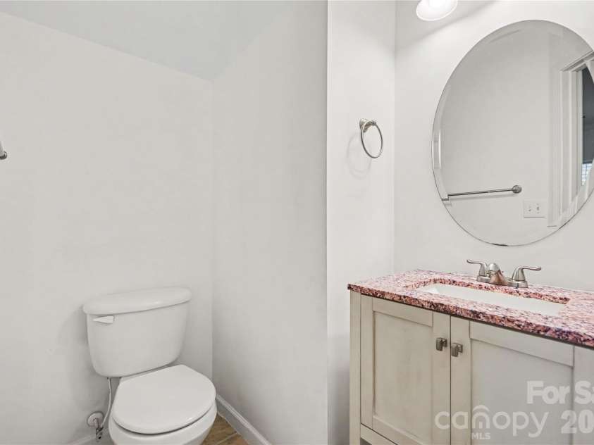 2823 Forest Grove Court, Charlotte, NC 28269.  MLS# CAR4398307, YatesRealty ID 33442. Half Bath on Main