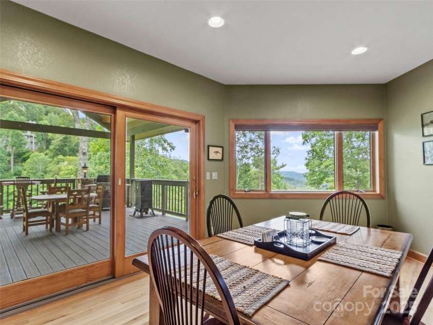 151 Austin Mountain Drive, Burnsville, NC 28714.  MLS# CAR4289442, YatesRealty ID 33443. Casual dining with deck & grilling access