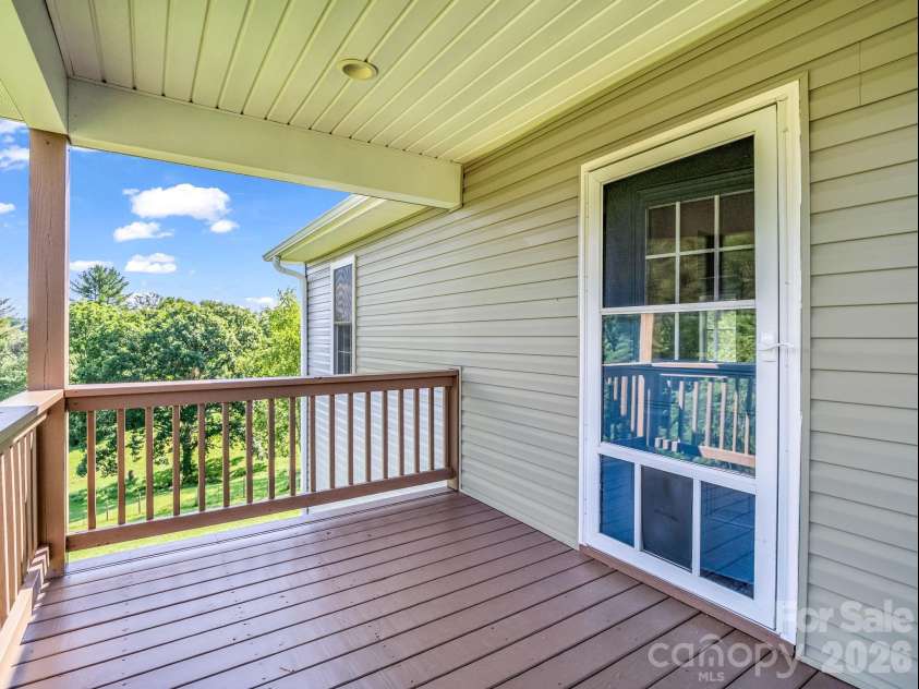 18 Old Chapman Place, Leicester, NC 28748.  MLS# CAR4398287, YatesRealty ID 33451. Back porch
