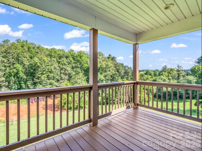 18 Old Chapman Place, Leicester, NC 28748.  MLS# CAR4398287, YatesRealty ID 33451. Back porch with great views!