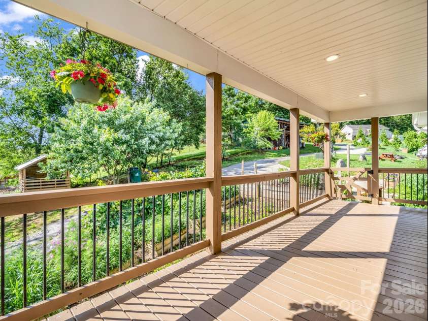 18 Old Chapman Place, Leicester, NC 28748.  MLS# CAR4398287, YatesRealty ID 33451. Large front porch with a great view