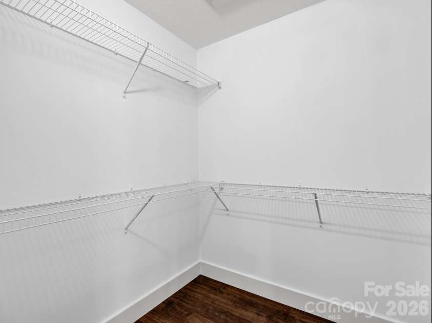 18 Old Chapman Place, Leicester, NC 28748.  MLS# CAR4398287, YatesRealty ID 33451. Primary bedroom walk-in closet
