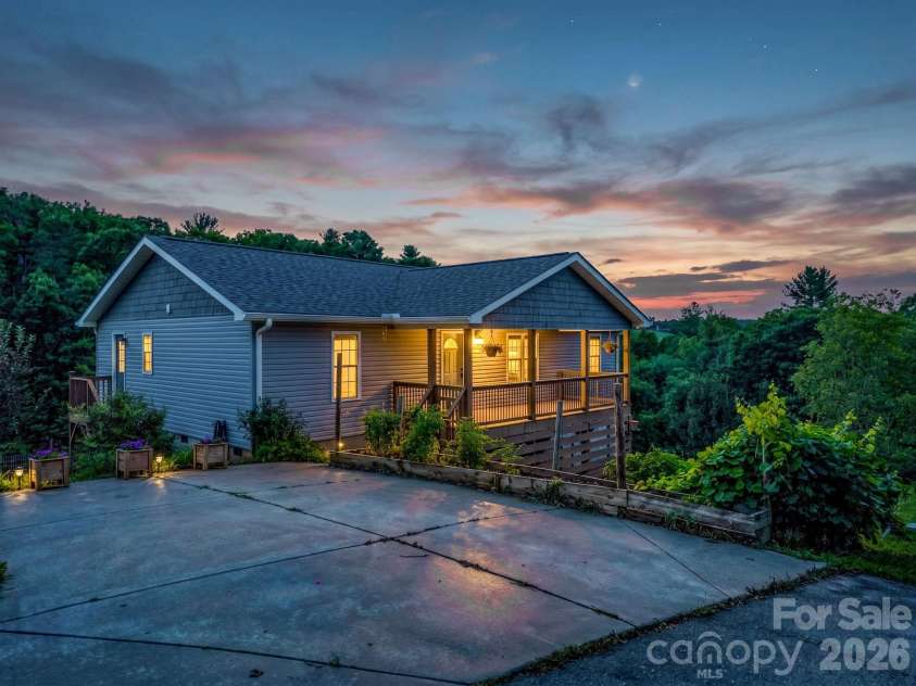 18 Old Chapman Place, Leicester, NC 28748.  MLS# CAR4398287, YatesRealty ID 33451. VIRTUAL TWILIGHT - Parking area at twilight