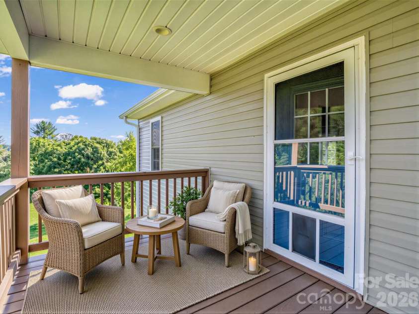18 Old Chapman Place, Leicester, NC 28748.  MLS# CAR4398287, YatesRealty ID 33451. VIRTUALLY STAGED - Back porch