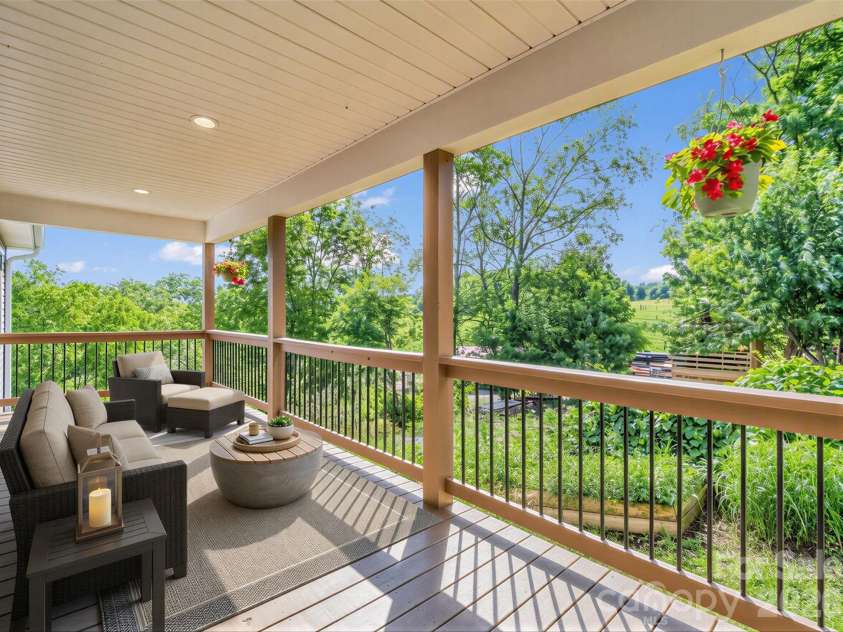18 Old Chapman Place, Leicester, NC 28748.  MLS# CAR4398287, YatesRealty ID 33451. VIRTUALLY STAGED - Front porch