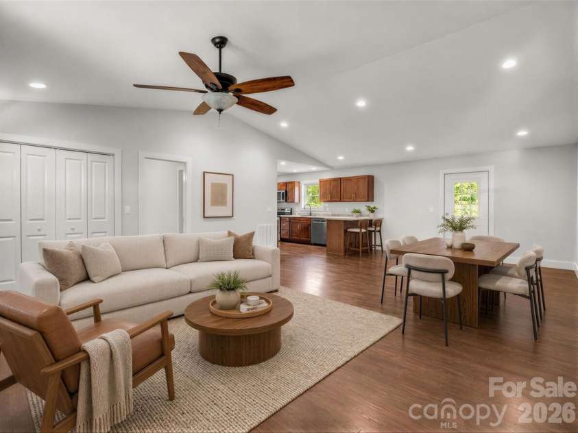 18 Old Chapman Place, Leicester, NC 28748.  MLS# CAR4398287, YatesRealty ID 33451. VIRTUALLY STAGED - Living room & dining area