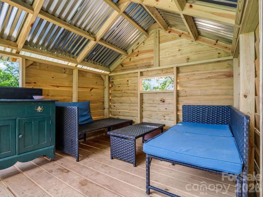 18 Old Chapman Place, Leicester, NC 28748.  MLS# CAR4398287, YatesRealty ID 33451. What a cool play place inside the garden tree house