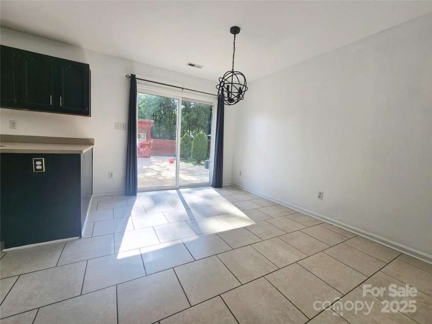 3108 Leicester Drive, Matthews, NC 28104.  MLS# CAR4273799, YatesRealty ID 33452. Breakfast Nook to Backyard